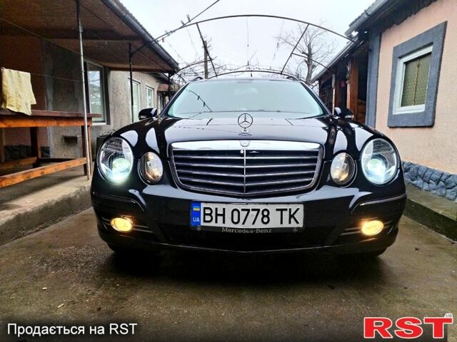 Черный Мерседес Е-Класс, объемом двигателя 2.1 л и пробегом 30400 тыс. км за 6500 $, фото 1 на Automoto.ua