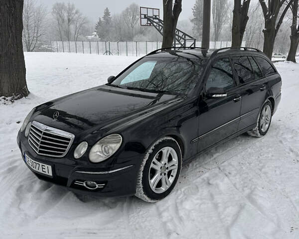 Черный Мерседес Е-Класс, объемом двигателя 2.2 л и пробегом 235 тыс. км за 8499 $, фото 1 на Automoto.ua
