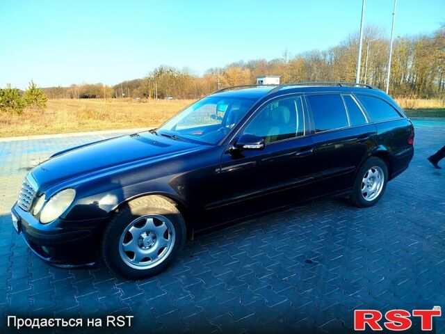 Чорний Мерседес Е-Клас, об'ємом двигуна 2.2 л та пробігом 401 тис. км за 7500 $, фото 1 на Automoto.ua