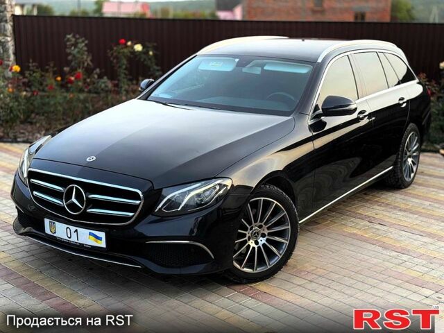 Черный Мерседес Е-Класс, объемом двигателя 2 л и пробегом 40 тыс. км за 21000 $, фото 1 на Automoto.ua