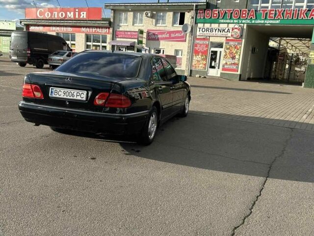 Черный Мерседес Е-Класс, объемом двигателя 2 л и пробегом 250 тыс. км за 3500 $, фото 1 на Automoto.ua