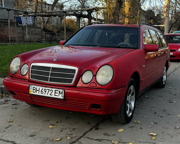 Красный Мерседес Е-Класс, объемом двигателя 2.3 л и пробегом 227 тыс. км за 2700 $, фото 1 на Automoto.ua