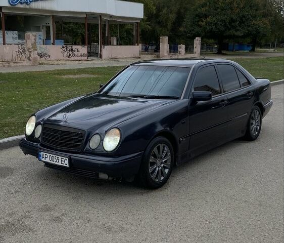 Сірий Мерседес Е-Клас, об'ємом двигуна 2.6 л та пробігом 450 тис. км за 2799 $, фото 1 на Automoto.ua
