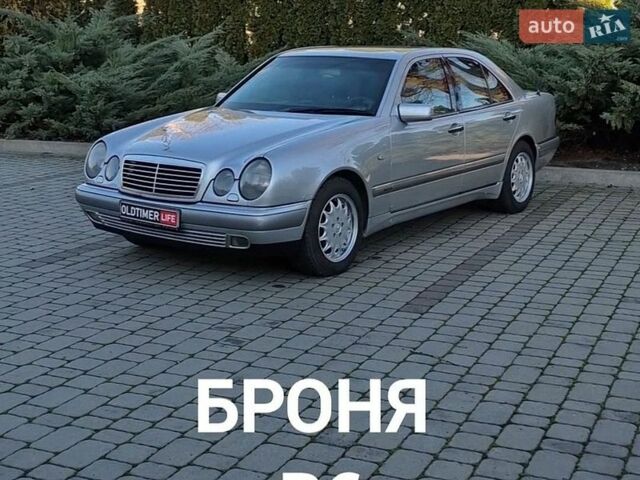 Серый Мерседес Е-Класс, объемом двигателя 4.97 л и пробегом 231 тыс. км за 11000 $, фото 1 на Automoto.ua