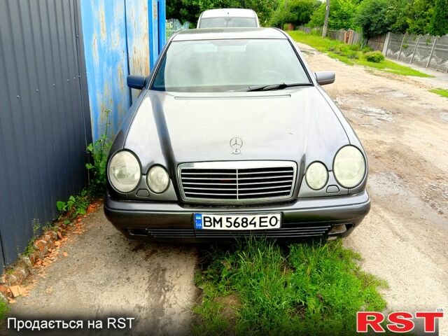 Сірий Мерседес Е-Клас, об'ємом двигуна 2 л та пробігом 250 тис. км за 3200 $, фото 1 на Automoto.ua