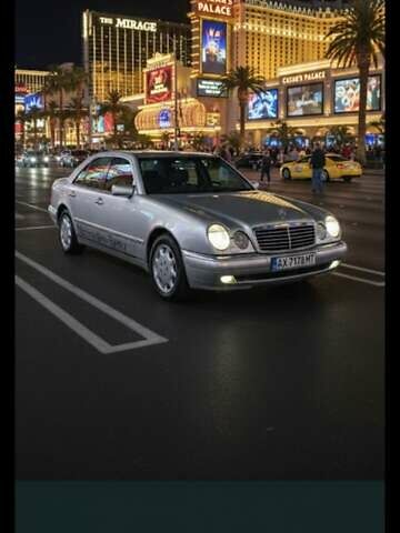 Серый Мерседес Е-Класс, объемом двигателя 2.8 л и пробегом 350 тыс. км за 3850 $, фото 1 на Automoto.ua