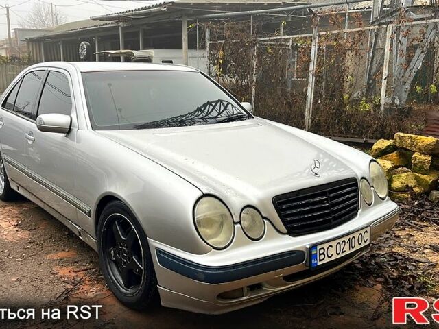 Сірий Мерседес Е-Клас, об'ємом двигуна 2.1 л та пробігом 400 тис. км за 2700 $, фото 1 на Automoto.ua