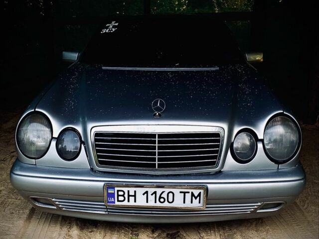 Сірий Мерседес Е-Клас, об'ємом двигуна 2.1 л та пробігом 220 тис. км за 4400 $, фото 1 на Automoto.ua