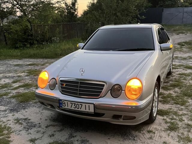 Сірий Мерседес Е-Клас, об'ємом двигуна 2 л та пробігом 293 тис. км за 6473 $, фото 1 на Automoto.ua