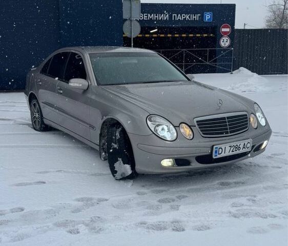 Сірий Мерседес Е-Клас, об'ємом двигуна 2.1 л та пробігом 400 тис. км за 6150 $, фото 1 на Automoto.ua