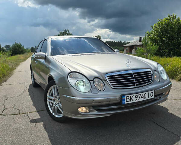 Сірий Мерседес Е-Клас, об'ємом двигуна 3 л та пробігом 378 тис. км за 8499 $, фото 1 на Automoto.ua
