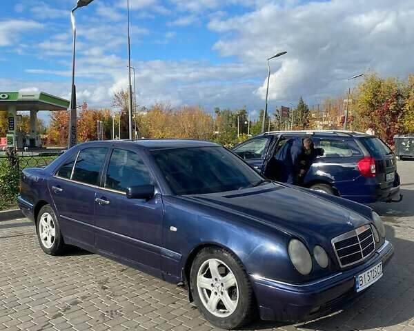 Синий Мерседес Е-Класс, объемом двигателя 2.3 л и пробегом 559 тыс. км за 2600 $, фото 1 на Automoto.ua