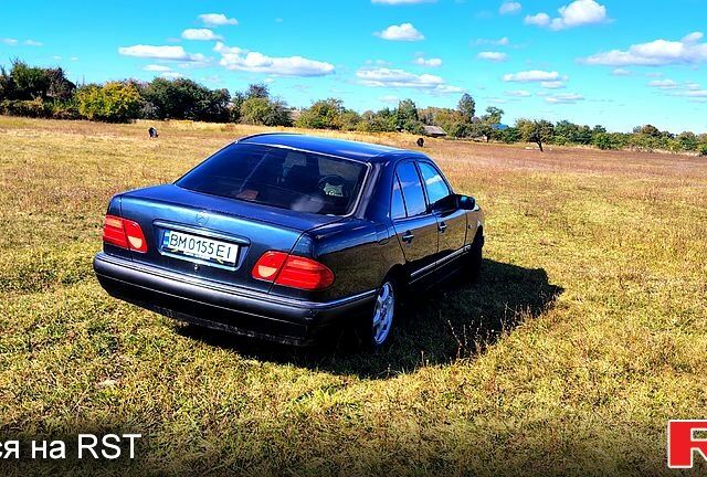 Синій Мерседес Е-Клас, об'ємом двигуна 2 л та пробігом 524 тис. км за 3100 $, фото 1 на Automoto.ua