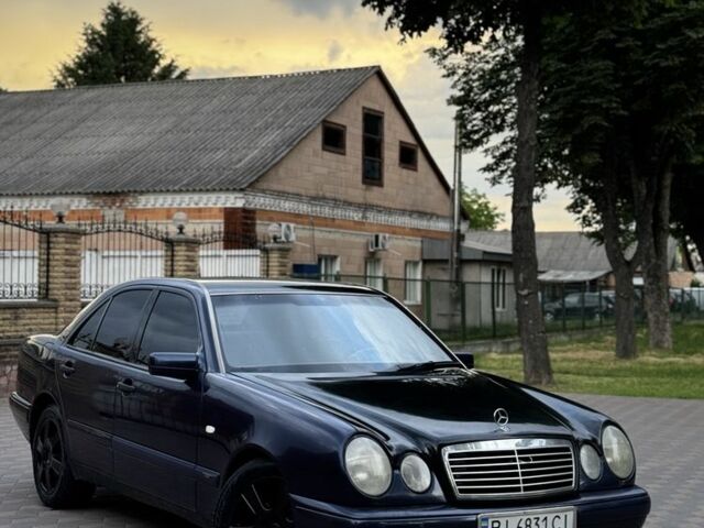 Синій Мерседес Е-Клас, об'ємом двигуна 2 л та пробігом 100 тис. км за 2899 $, фото 1 на Automoto.ua