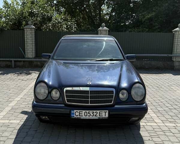 Синий Мерседес Е-Класс, объемом двигателя 2 л и пробегом 395 тыс. км за 3000 $, фото 1 на Automoto.ua