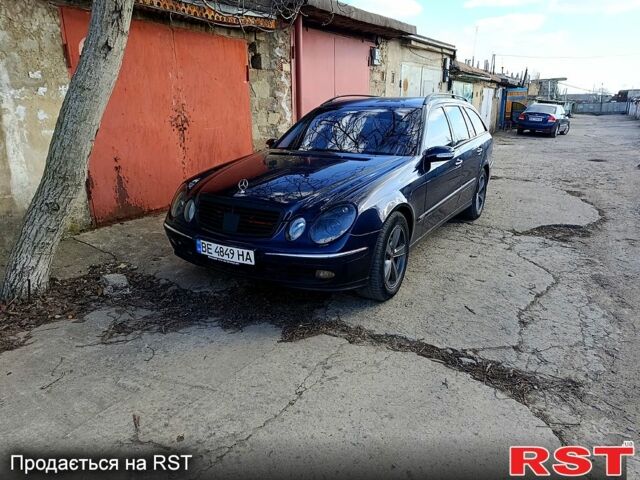 Синий Мерседес Е-Класс, объемом двигателя 3.2 л и пробегом 200 тыс. км за 6300 $, фото 1 на Automoto.ua