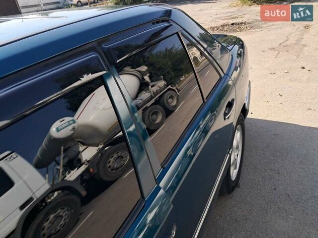 Зелений Мерседес Е-Клас, об'ємом двигуна 2 л та пробігом 366 тис. км за 3600 $, фото 1 на Automoto.ua