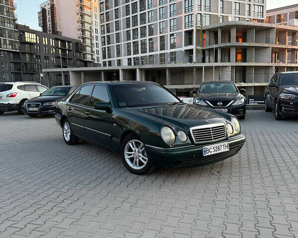 Зеленый Мерседес Е-Класс, объемом двигателя 2 л и пробегом 494 тыс. км за 2399 $, фото 1 на Automoto.ua