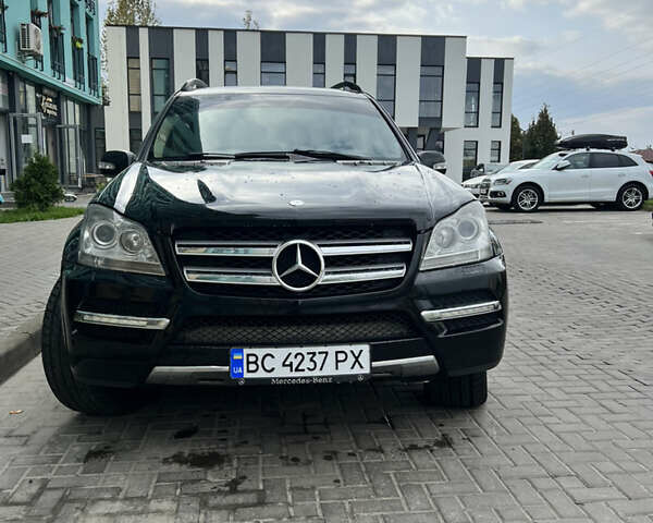 Чорний Мерседес ГЛ-Клас, об'ємом двигуна 4.66 л та пробігом 310 тис. км за 14000 $, фото 1 на Automoto.ua