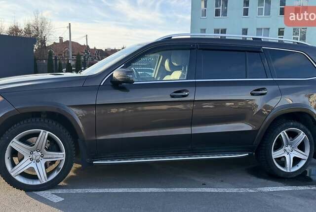 Коричневый Мерседес ГЛ-класс, объемом двигателя 4.66 л и пробегом 217 тыс. км за 27000 $, фото 1 на Automoto.ua