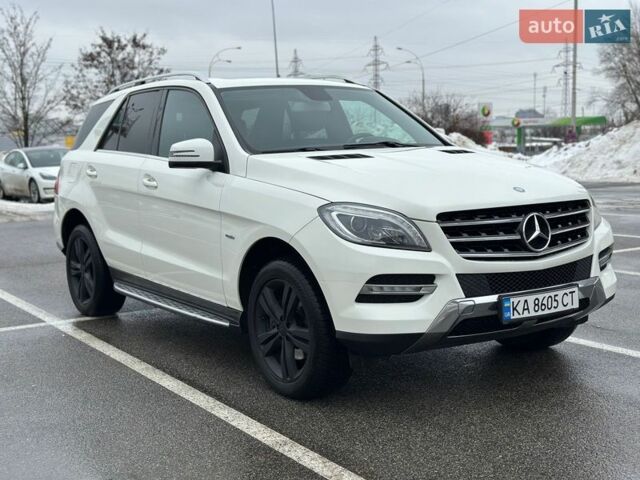 Белый Мерседес М-Класс, объемом двигателя 3.5 л и пробегом 205 тыс. км за 22000 $, фото 1 на Automoto.ua