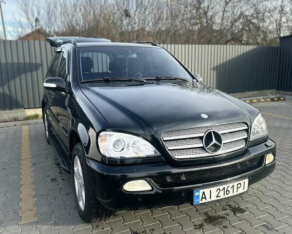 Черный Мерседес М-Класс, объемом двигателя 3.72 л и пробегом 300 тыс. км за 7700 $, фото 1 на Automoto.ua