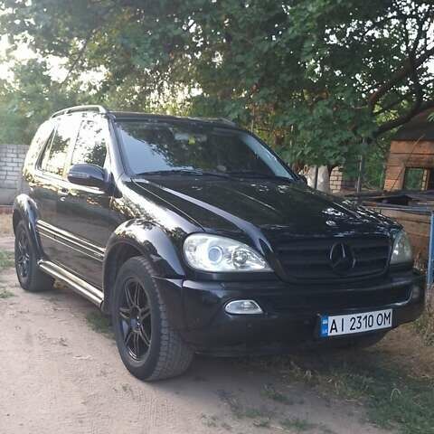 Черный Мерседес М-Класс, объемом двигателя 3.7 л и пробегом 322 тыс. км за 6000 $, фото 1 на Automoto.ua