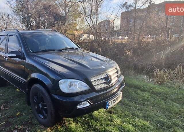 Черный Мерседес М-Класс, объемом двигателя 3.72 л и пробегом 398 тыс. км за 6000 $, фото 1 на Automoto.ua