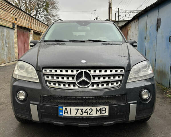 Черный Мерседес М-Класс, объемом двигателя 4.97 л и пробегом 277 тыс. км за 9900 $, фото 1 на Automoto.ua