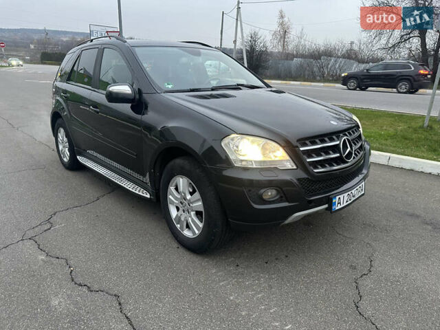 Черный Мерседес М-Класс, объемом двигателя 2.99 л и пробегом 480 тыс. км за 13500 $, фото 1 на Automoto.ua