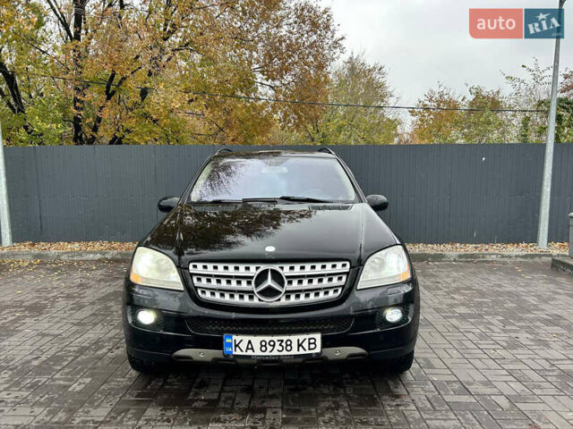 Черный Мерседес М-Класс, объемом двигателя 3.5 л и пробегом 276 тыс. км за 10499 $, фото 1 на Automoto.ua