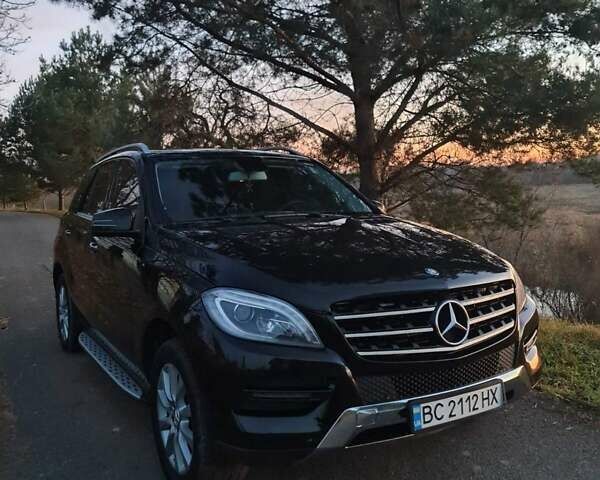 Черный Мерседес М-Класс, объемом двигателя 3 л и пробегом 215 тыс. км за 23000 $, фото 1 на Automoto.ua