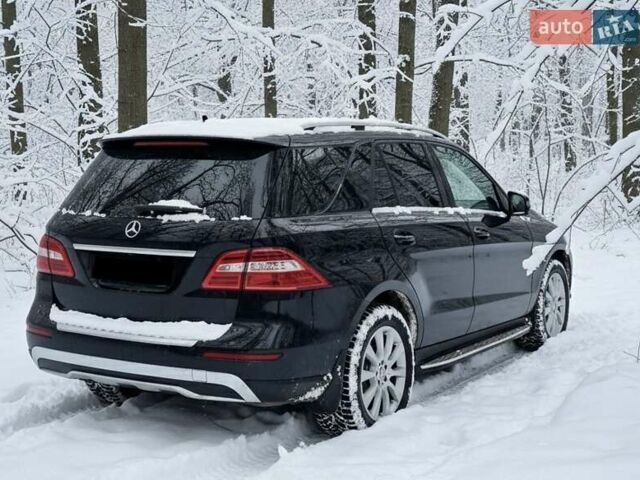 Чорний Мерседес М-Клас, об'ємом двигуна 3 л та пробігом 162 тис. км за 27500 $, фото 1 на Automoto.ua
