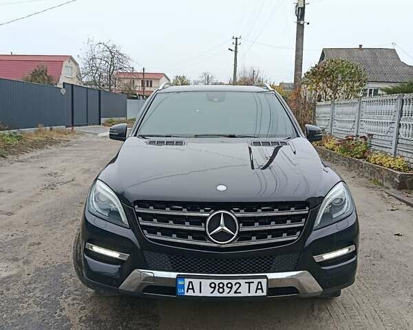 Черный Мерседес М-Класс, объемом двигателя 2.14 л и пробегом 172 тыс. км за 24000 $, фото 1 на Automoto.ua