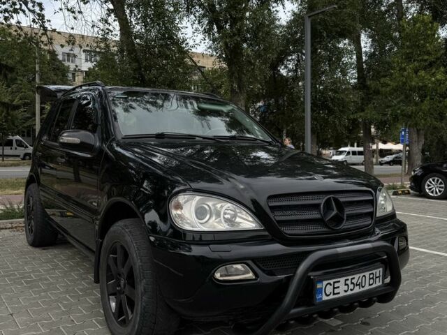 Черный Мерседес МЛ 320, объемом двигателя 3.2 л и пробегом 301 тыс. км за 7100 $, фото 1 на Automoto.ua