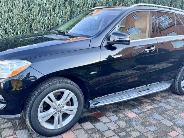 Чорний Мерседес МЛ 350, об'ємом двигуна 3 л та пробігом 184 тис. км за 18900 $, фото 1 на Automoto.ua