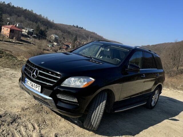 Чорний Мерседес МЛ 350, об'ємом двигуна 3 л та пробігом 231 тис. км за 20800 $, фото 1 на Automoto.ua