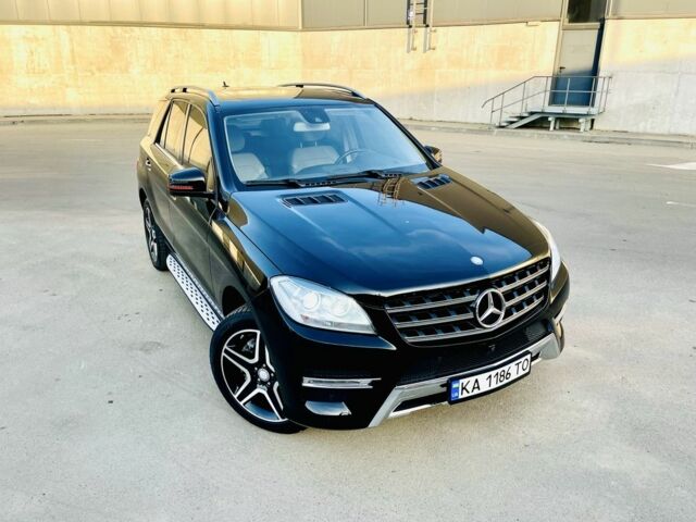 Чорний Мерседес МЛ 400, об'ємом двигуна 3 л та пробігом 157 тис. км за 25300 $, фото 1 на Automoto.ua