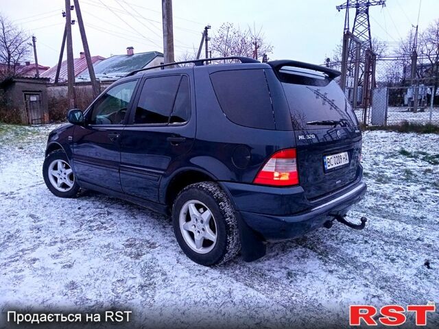 Чорний Мерседес ML-Class, об'ємом двигуна 3.2 л та пробігом 290 тис. км за 7900 $, фото 1 на Automoto.ua