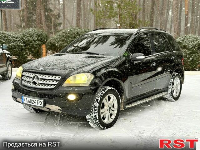 Чорний Мерседес МЛ класс, об'ємом двигуна 3.5 л та пробігом 35000 тис. км за 9200 $, фото 1 на Automoto.ua