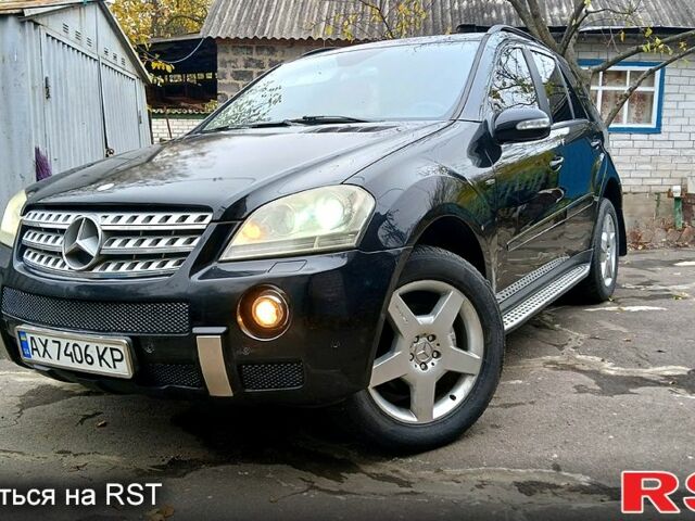 Черный Мерседес МЛ класс, объемом двигателя 3.5 л и пробегом 230 тыс. км за 9950 $, фото 1 на Automoto.ua
