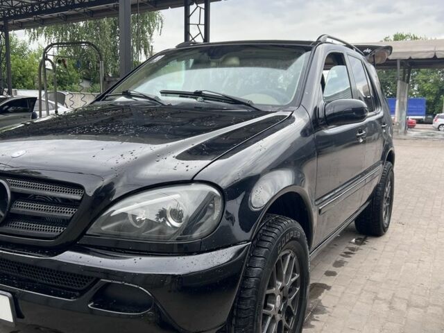 Чорний Мерседес МЛ, об'ємом двигуна 3.2 л та пробігом 157 тис. км за 5700 $, фото 1 на Automoto.ua
