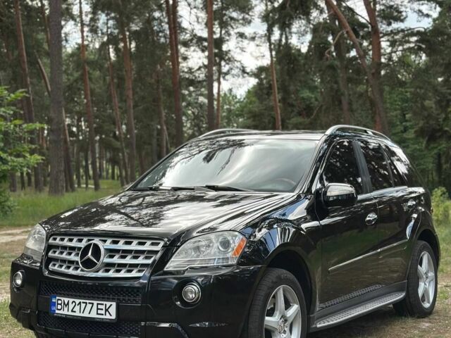 Чорний Мерседес МЛ, об'ємом двигуна 5.5 л та пробігом 255 тис. км за 12000 $, фото 1 на Automoto.ua