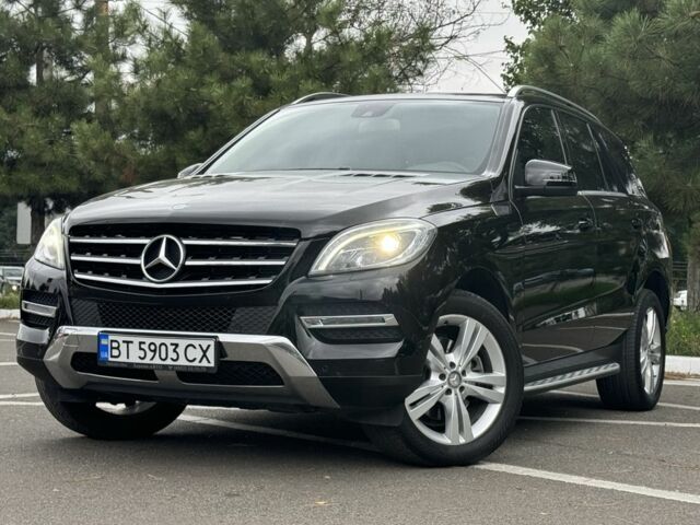 Черный Мерседес ML серия, объемом двигателя 3 л и пробегом 219 тыс. км за 21999 $, фото 1 на Automoto.ua