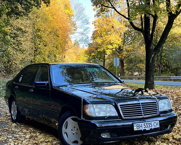 Черный Мерседес С Класс, объемом двигателя 5 л и пробегом 347 тыс. км за 23217 $, фото 1 на Automoto.ua