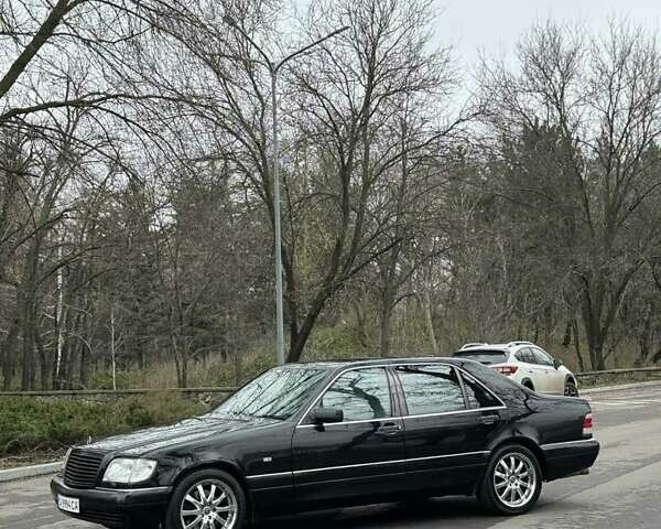 Черный Мерседес С Класс, объемом двигателя 5 л и пробегом 258 тыс. км за 6700 $, фото 1 на Automoto.ua