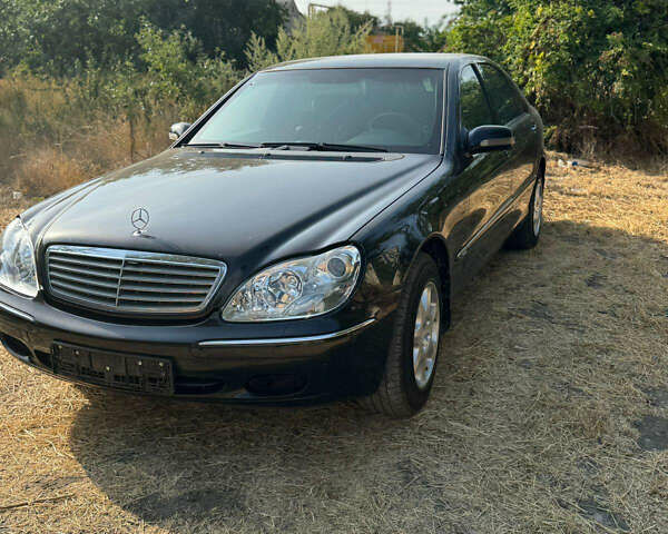 Чорний Мерседес С Клас, об'ємом двигуна 5.79 л та пробігом 153 тис. км за 16999 $, фото 1 на Automoto.ua