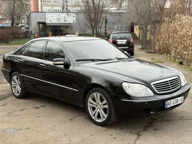 Черный Мерседес С Класс, объемом двигателя 5 л и пробегом 279 тыс. км за 3950 $, фото 1 на Automoto.ua