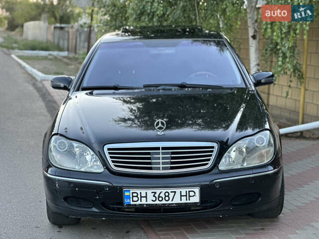 Черный Мерседес С Класс, объемом двигателя 5.79 л и пробегом 300 тыс. км за 3800 $, фото 1 на Automoto.ua