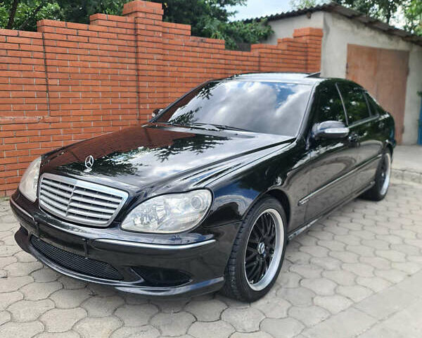 Чорний Мерседес С Клас, об'ємом двигуна 5.5 л та пробігом 281 тис. км за 5999 $, фото 1 на Automoto.ua